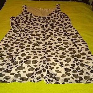 A sleavless, soft material leopard dress